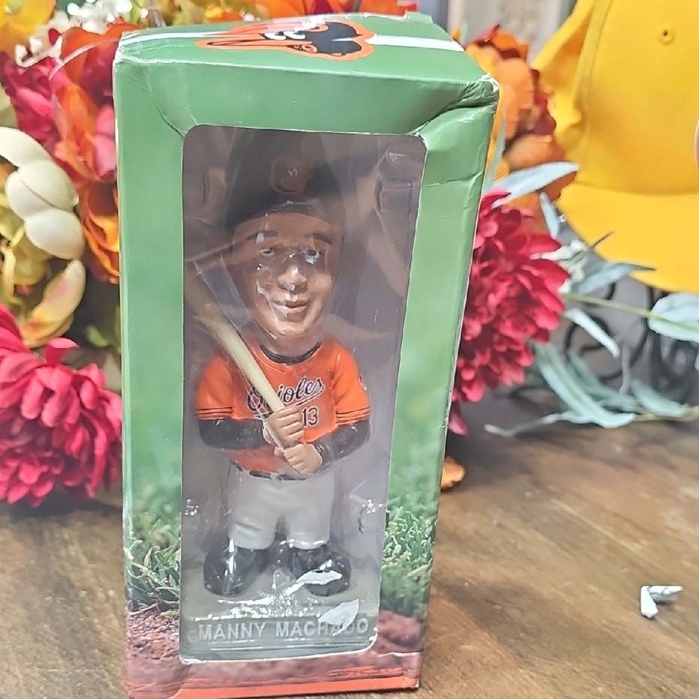 Baseball Player MANNY MACHDO Bobblehead in Orange and Black